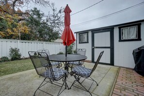 Side yard, table and chairs