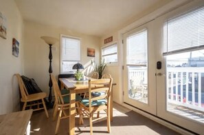 Open concept dining area w/additional seating, salt rock lamps & cozy decor.