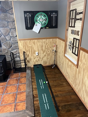 Putting green and darts added to family room!