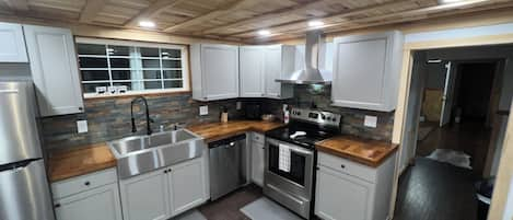 Full kitchen, +dishwasher with servery breakfast nook connected to dining area 