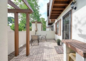 Relax on our peaceful patio area after a day of beach or golfing!