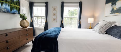 Bedroom 2 - Queen Bed, 50" Smart TV, full size dresser, closet, blinds, curtains