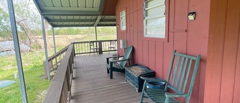 A view of the wrap around porch to enjoy your morning coffee or evening beverage. 