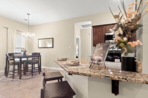 Want to eat at the counter? No problem! There's a kitchen island for that. And we've got a regular coffee maker and a Keurig, so you can have your coffee your way.