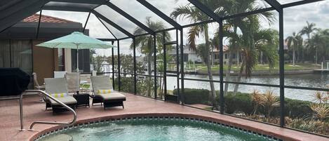 Heated, salt water pool with beautiful canal views.