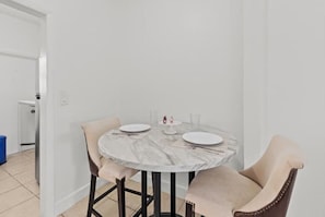 Enjoy a spacious dinning table for your meals.