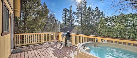 Deck with hot tub and tree tops!
