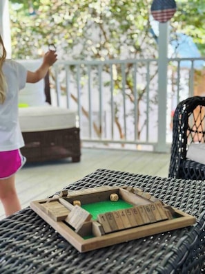 Enjoy relaxing on the porch and playing the Ring Game and “Shut the Box”Board game. 