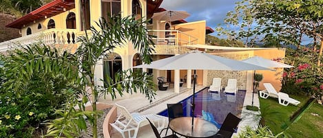 2400 sq ft Villa, 4 bedrooms, large kitchen, 2.5 baths, pool with sun shelf