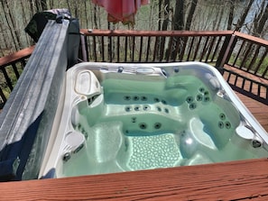 Hot Tub overlooking the lake.  This hot tub is on it's own deck and is shared. 