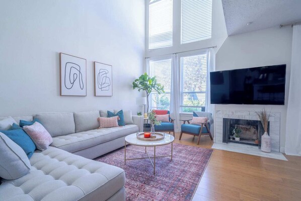 Enjoy plenty of natural light with the floor to ceiling windows