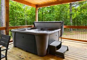 Dip into relaxation in your private hot tub oasis. Perfect for starry nights and soothing soaks!