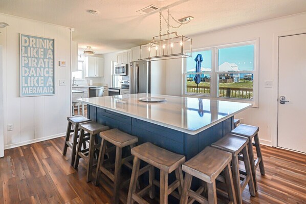 Large island open to living room and kitchen