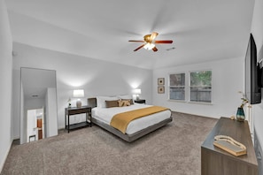 Primary bedroom with a king bed