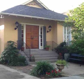 Front of house. Just past front door is a foyer which leads to your suite