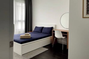 Fluffy pillows, ultra soft bedding, blackout curtains for a good night sleep
