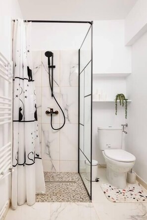 Bathroom with complimentary toiletries and towels