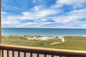 The covered deck with beautiful ocean views