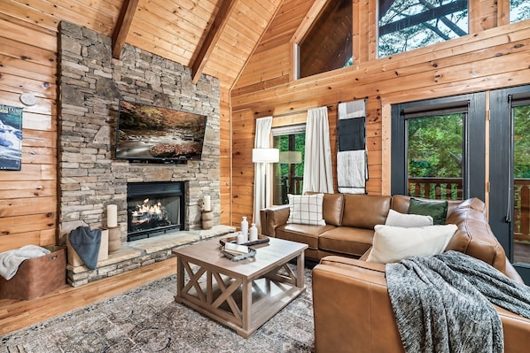 Relax in the cozy living room in your mountain oasis