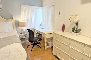 King Bedroom includes a full desk and a dresser, plus a spacious closet