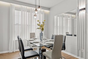 An elegant dining space with seating for 6
