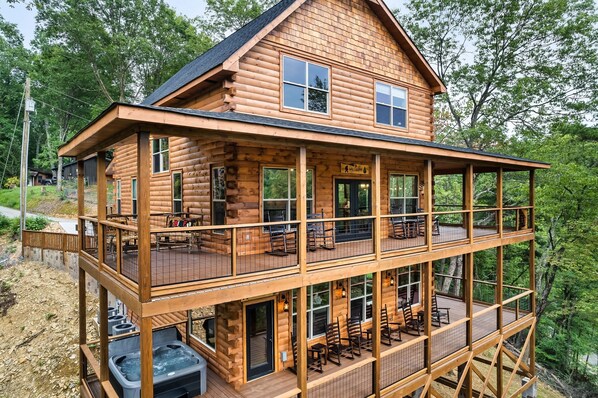 Back view of house - Hot tub on bottom deck.