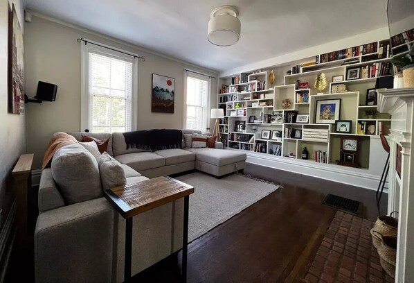 Living room with sliding barn door for privacy