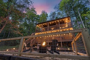 lower level with hot tub and firepit