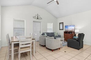Open concept newly furnished living and dining area on the 2nd floor.