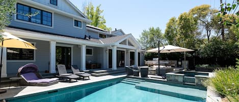 Imagine swimming in this pristine back yard pool while enjoying our California sunshine and relaxing in the hot tub at the far end ...