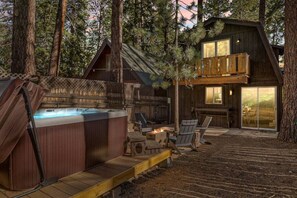 Amazing outdoor space with a hot tub, fire pit and outdoor seating to take in all this amazing location has to offer.