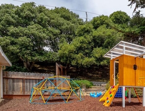 Your private backyard playground with trampoline, swings slide, climbing dome, and more.