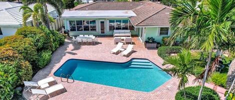 Single story classic Florida Villa with Heated Pool, Tiki Hut and more!