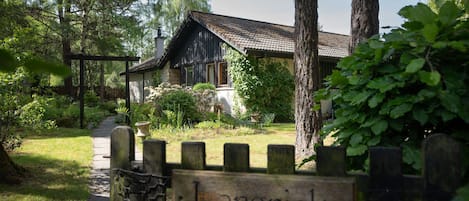 Langrick garden gate and house behind