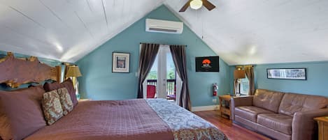 The Morning Glory Suite is a second floor room with a King bed and private balcony.