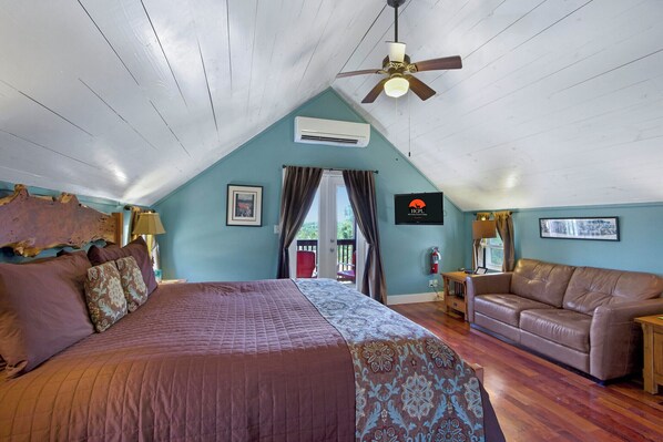 The Morning Glory Suite is a second floor room with a King bed and private balcony.