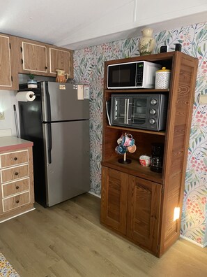 Kitchen has cooktop, microwave, coffee maker & an air fryer/oven/toaster combo!