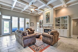 Living area #1 with electric fireplace and queen sleeper sofa