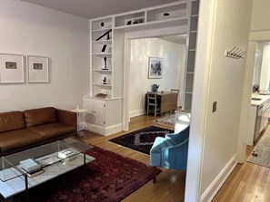 Formal living room with leather sofa.