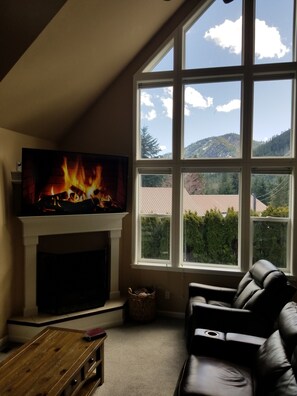 Big Living room with huge window to see all the Nature near you!