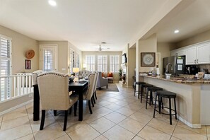 Spacious open-plan design with abundant natural light - perfect for entertaining, sharing meals, or relaxing with a glass of wine