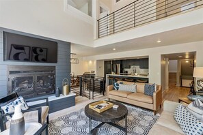 Main Living Room; Main Level, Adjacent to kitchen, dining space & outdoor deck