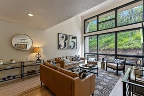 Main Living Room; Main Level, Adjacent to kitchen, dining space & outdoor deck