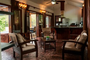 Furniture, Indoors, Living Room, Floor, Flooring