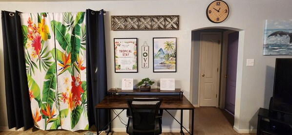 Dedicated work space with comfortable chair and desk.
