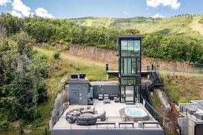 Community rooftop hot tub and seating area