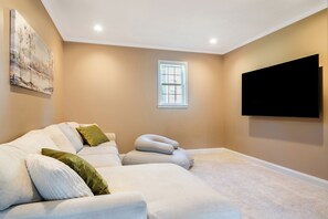 TV Room ~ Moon Pod bean bag & 75" Smart TV