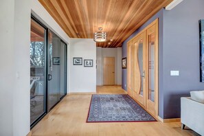 Beautiful entry way with wood ceilings