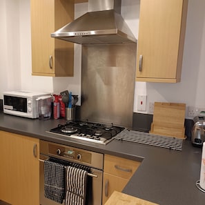 Kitchen with Microwave Oven, Soup Kettle, and a host of other options.