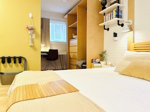 A workplace with super-strong Wi-Fi access and a massage chair pad.